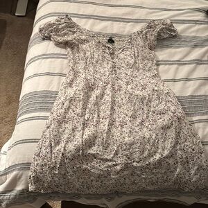 Sundress with laced bodice and cap sleeves. Size 8 small print floral design.